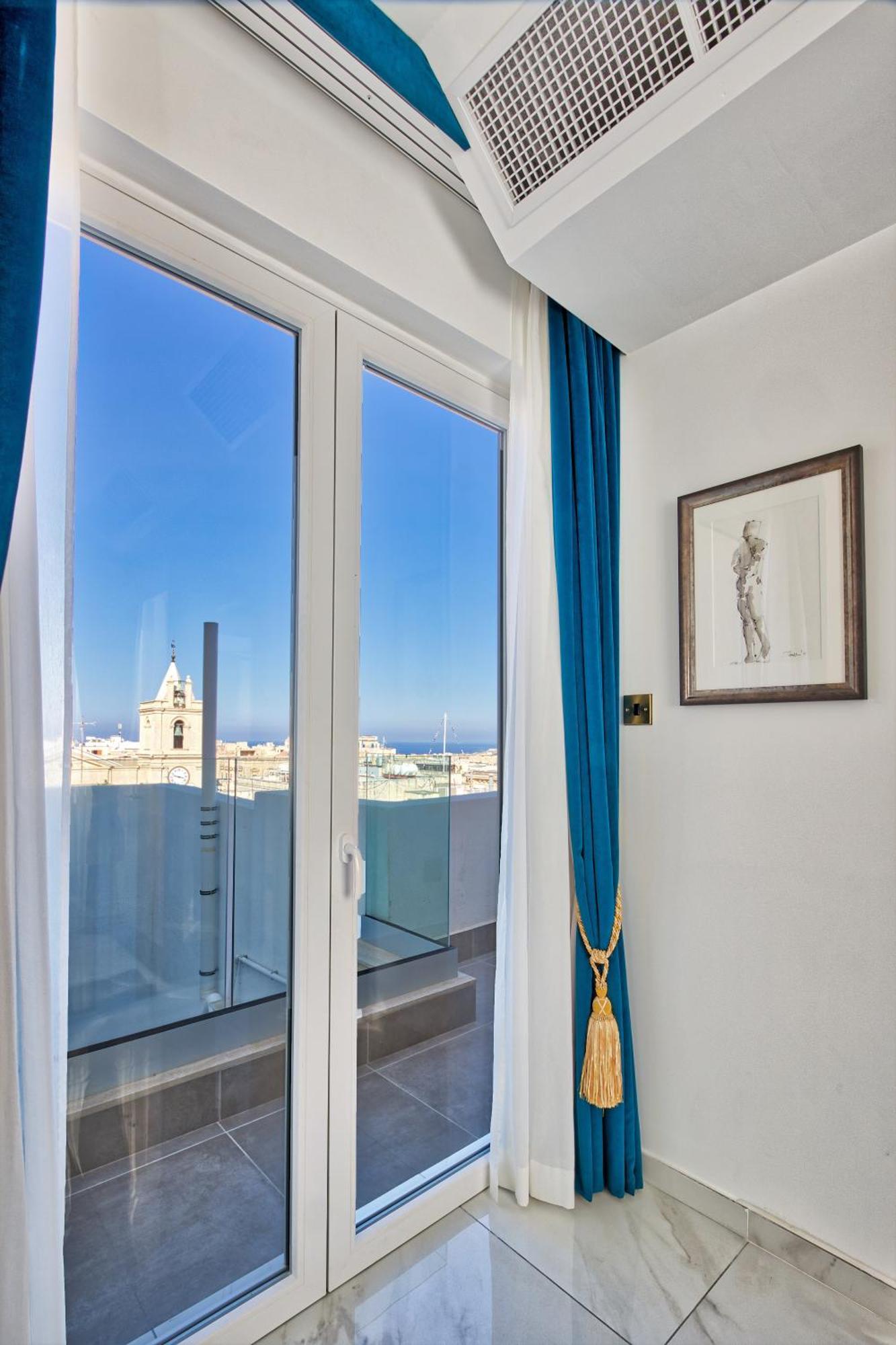Palazzo Rosaria Boutique Hotel La Valeta Habitación foto